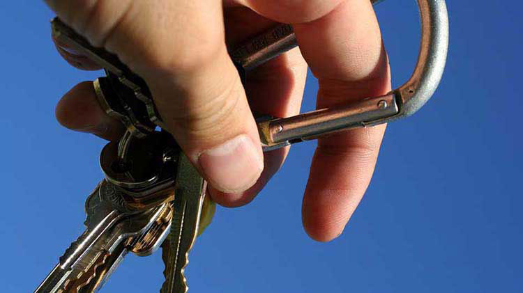 Hand holding key ring