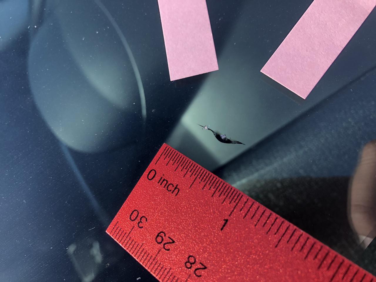 Image showing an example of a combination windshield crack.